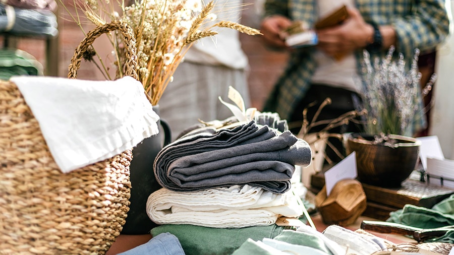 A pile of cloths sitting on top of a table.