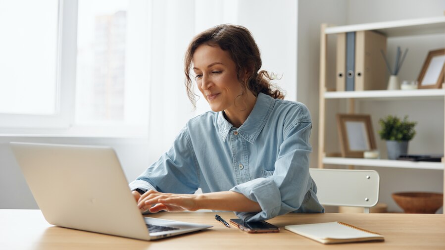 Businesswoman working on her laptop.