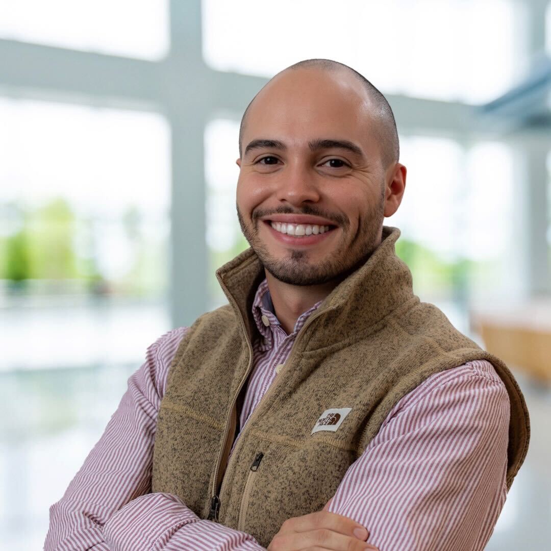 Author headshot of Korey Cournoyer.