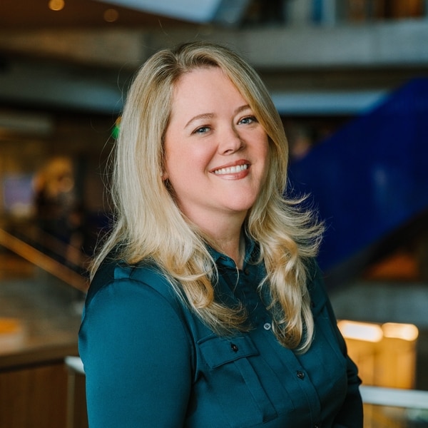 Headshot of Cassie Divine.