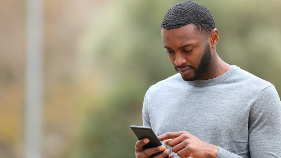 A man using his phone.