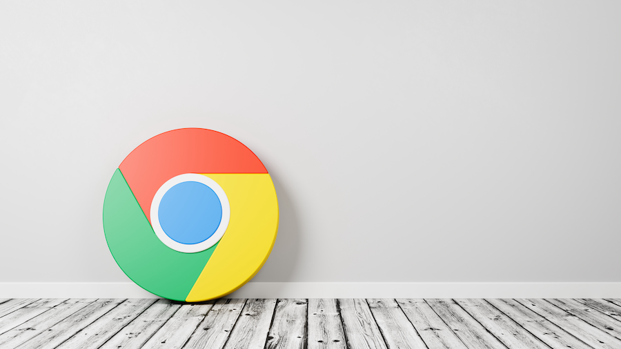 Google Chrome logo on a wood floor.