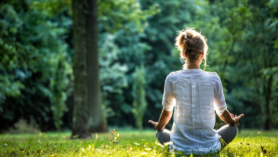 Woman practicing yoga.