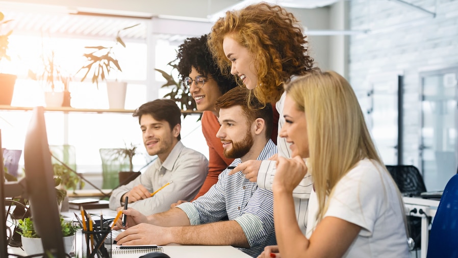 A team of people discussing marketing strategy.