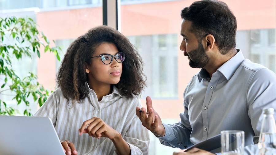 Business partners discussing work.