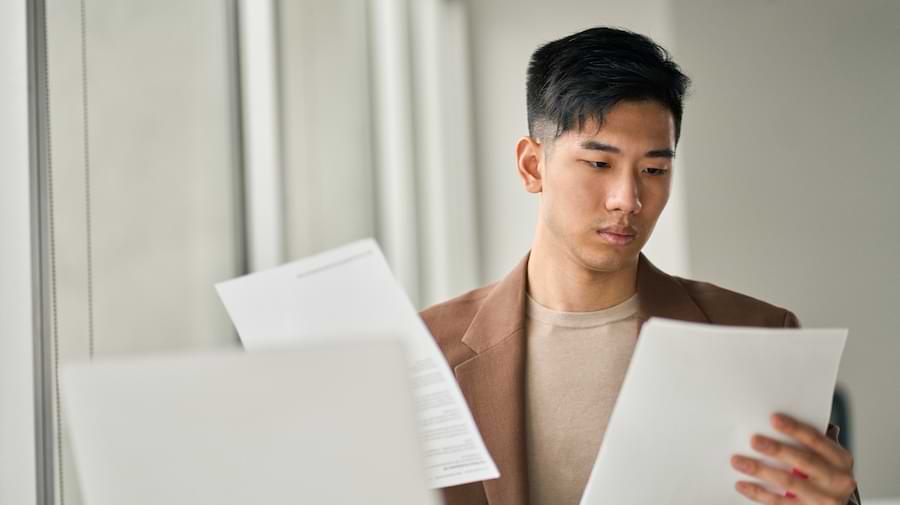 Businessman looking at documents.